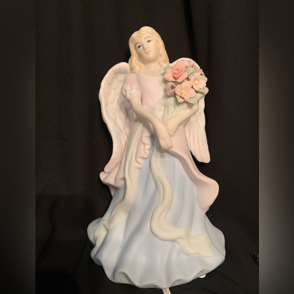 Porcelain Angel Light. Electric. Plug in. Avon brand. Beautiful.